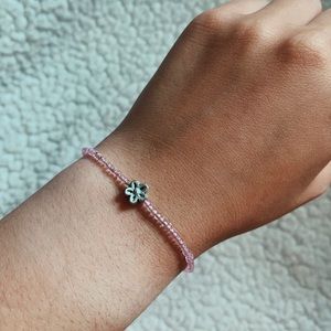 Pink and clear flower bead bracelet